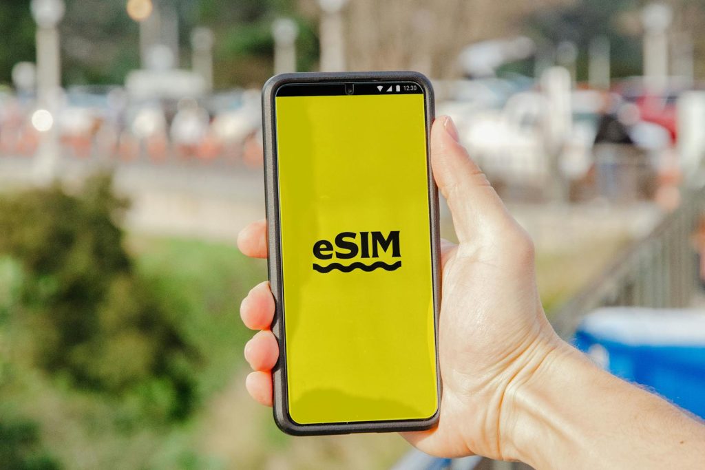 Text on Yellow Screen of Smartphone showing esim